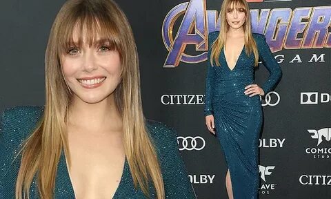 Elizabeth Olsen shows off hourglass figure in glittering blu