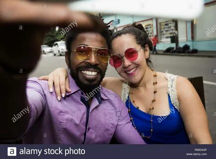 Japanese woman and black man dating and having fun in the street. 