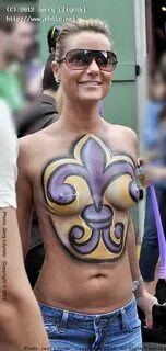 In the French Quarter, one lady shows her body painting to t