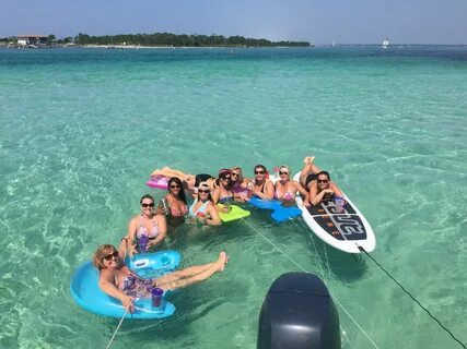 Rent a boat and paddleboard and spend the day at Crab Island