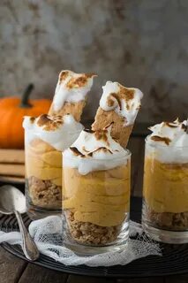 Pumpkin pie cheesecake shooters topped with toasted meringue