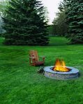 Create an outdoor fire pit for a cozy place to gather friend