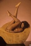 Pretty ebony centerfold model Azizi Johari poses naked in va