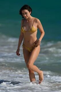 Claudia Bouza - In a gold bikini in Miami Beach GotCeleb