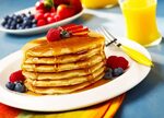 Food & Beverage Photographer Pancakes with berries & Orange 