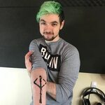 Jacksepticeye's tattoo! It's the hunters mark from bloodbour