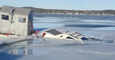 Truck Takes Polar Plunge Into Frozen Lake