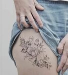Tattoo thigh flower fineline by Tritoan Ly Flower thigh tatt