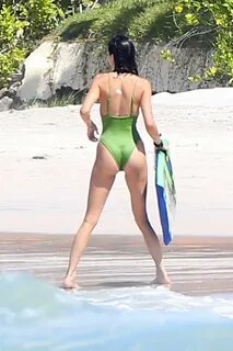 kendall jenner wore a green swimsuit as she hits the beach w