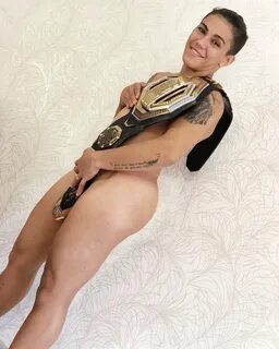 New UFC champ Jessica Andrade poses naked with just belt cov