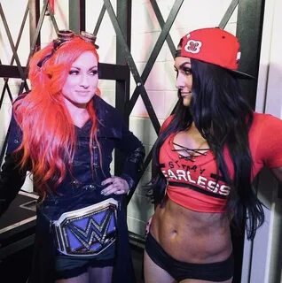 Becky and Nikki Bella giving each other "the look" - Imgur