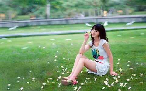 Cute japanese woman in park