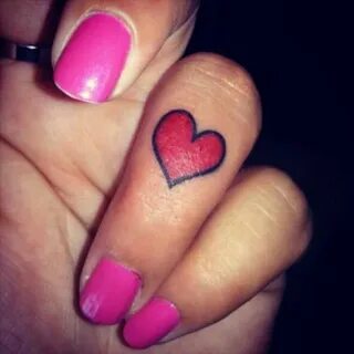 Red heart on Bren Les finger. Heart tattoo on finger, Red he
