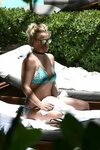 Britney Spears in Bikini - Sunbathes Poolside in Miami 06/06