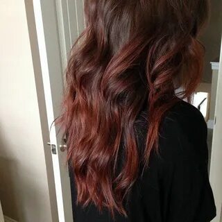 Her formula is Redken Shades EQ Cherry Cola Rocket Fire (50/