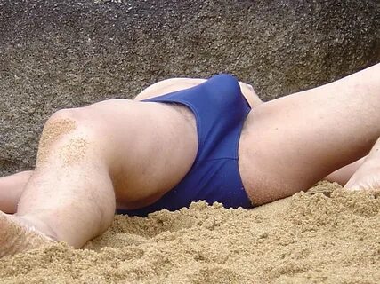 BLUE SPEEDO 011 (sleeping man with a great bulge) - a photo 
