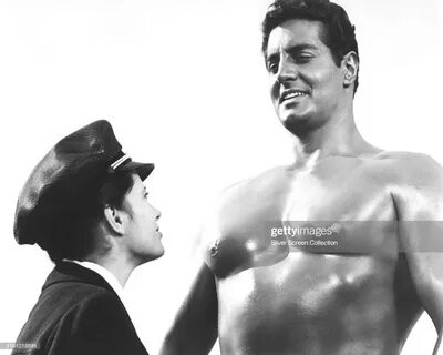 Actor and bodybuilder Peter Lupus as Flex Martian and Lucian