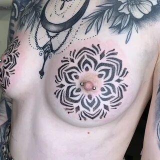 Tattoo by boobs