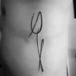 Samantha Park on Instagram: "#minimalist #tulip #tattoo for 