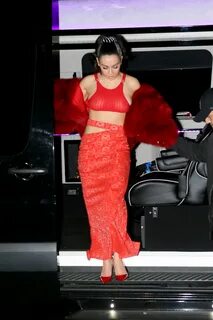 Charli XCX Is sizzling hot donning a red gown accompanied by