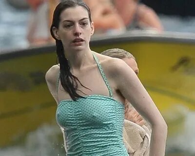 Anne Hathaway Swimsuit Pokies - The Nip Slip