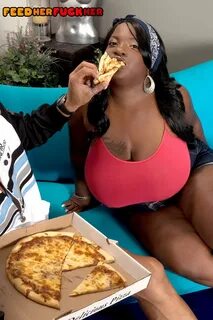 Ebony BIG HOT LADY Diamond Knights exposing humungous boobs while gobbling pizza...