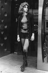 Hot pants and boots on the street, 1970s. Hot pants, Fashion