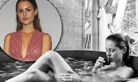Isabelle Cornish poses naked in an outdoor bathtub in latest