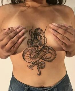 Dragon mid chest black ink female tattoo - - #black #chest #
