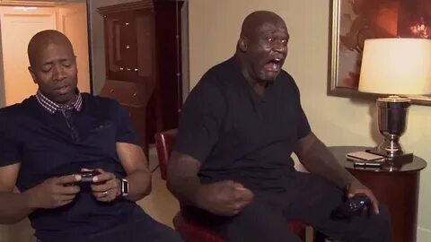 Shaq holding a game controller - GIF on Imgur