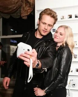 NEW HQ Pic of Sam Heughan and MacKenzie Mauzy at "ICONS" Cel