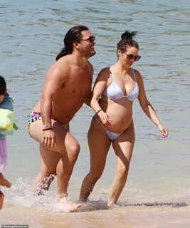 Pregnant Scheana Shay shows off her baby bump in a bikini.