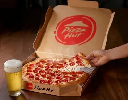 Pizza Hut Hopes to Gain Edge in Pizza Wars by Expanding Beer