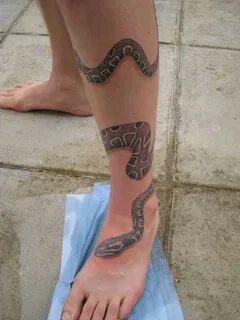 Awesome snake wrapped around leg tattoo - Tattoos Book - 65.