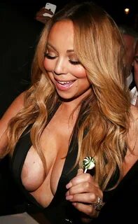 Mariah Carey - Big boobs and cleavage.