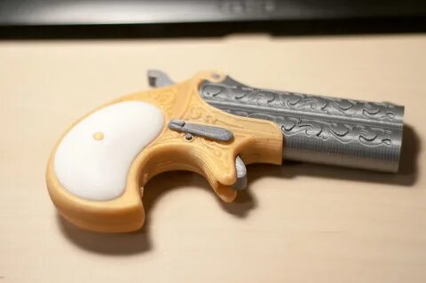 Модель карманного пистолета Remington Derringer