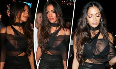 Nicole Scherzinger looks worse for wear as she almost suffer