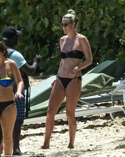 Michael Carrick's wife Lisa sizzles in bikini on break Daily