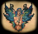 Evil sexy fairy lower back tattoo by Jackie Rabbit Flickr