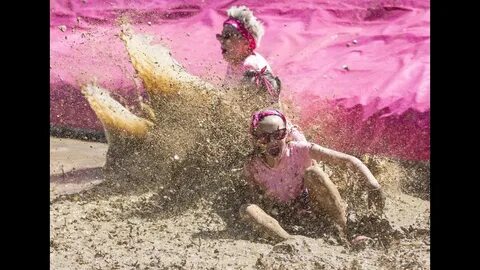 A 360-degree roll in the mud pit at Dirty Girl Mud Run 2017 
