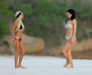 Kylie jenner with Pia Mia in a tiny white perforated bikini 