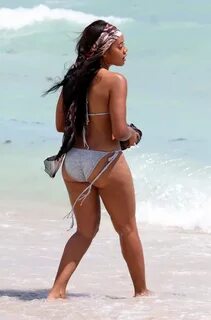 Angela Simmons busty booty in bikini on a beach in Miami. ia