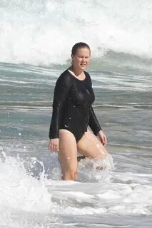 Amy Schumer & Chris Fischer Take a Post Christmas Swim in St