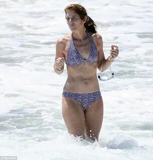 Caroline Kennedy looks bikini fabulous at 54 during beach ho