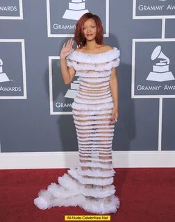 Rihanna posing in semitransparent dress at Grammys 2011