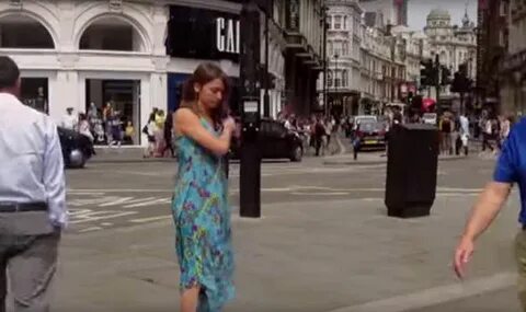 Jae West strips in London's Piccadilly Circus to raise aware