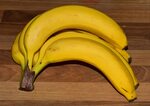 Bananas on a wooden board free image download