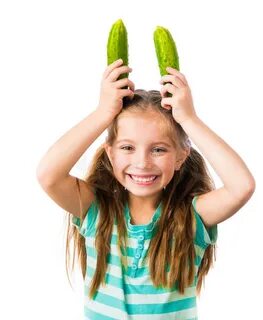 Little girl with cucumbers stock image. Image of girl - 3622