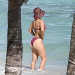 Jennifer Lopez shows off her curves in a tiny metallic pink 