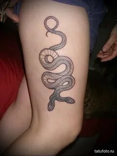 snake tattoo for girls on the side of the leg - tatufoto.com